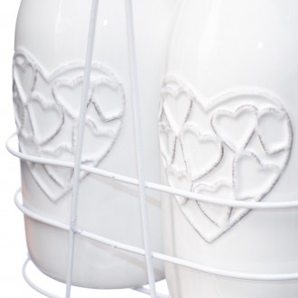 Набор выполнен из белой керамика с рельефным рисунком сердец. Масленки имеют съе. . фото 3
