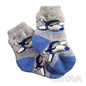 Теплые носочки из натуральной шерсти непременно согреют вашего малыша в зимние д. . фото 1
