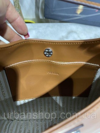 
В наявності Жіноча сумка Шопер в стилі Prada
Відмінної якості
Колір коричневий
. . фото 7
