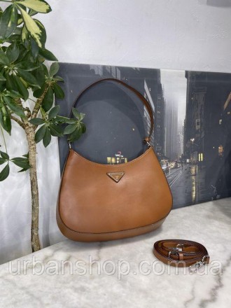 
В наявності Жіноча сумка Шопер в стилі Prada
Відмінної якості
Колір коричневий
. . фото 2