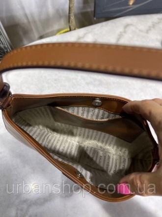 
В наявності Жіноча сумка Шопер в стилі Prada
Відмінної якості
Колір коричневий
. . фото 9