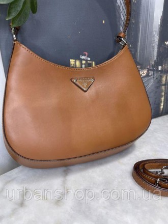 
В наявності Жіноча сумка Шопер в стилі Prada
Відмінної якості
Колір коричневий
. . фото 3