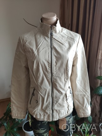 Куртка женская из экокожи HOLDLUCK изготовлена из искусственной кожи высокого ка. . фото 1