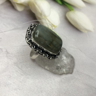 Предлагаем Вам купить элегантное кольцо с камнем лабрадор в серебре.
Размер 17,5. . фото 6