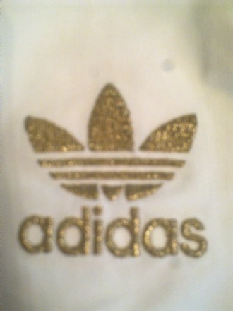 Новые штанишки от Адидас серии с золотыми лампасами и логотипом. размер S.. . фото 2