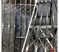 Раздвижные решетки Боствиг из нержавеющей стали.
Для грузовых лифтов в химическ. . фото 3