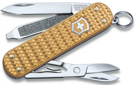 Мультитул нож Victorinox Classic SD Precious Alox Brass Gold 0.6221.408G
Швейцар. . фото 2