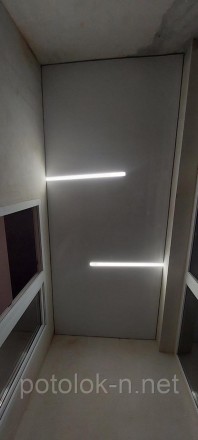 Натяжной потолок со световыми линиями в гостиную в Днепре
Натяжной потолок со св. . фото 6