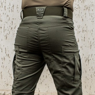 Прочные тактические брюки "DEFENDER" OLIVE из эластичной ткани с ремнём!
Констру. . фото 5