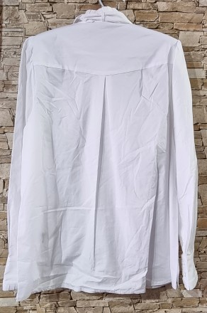 Мегастильная белоснежная блуза с воротником, декорирована оборками плиссе и завя. . фото 3