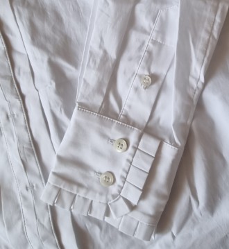 Мегастильная белоснежная блуза с воротником, декорирована оборками плиссе и завя. . фото 4