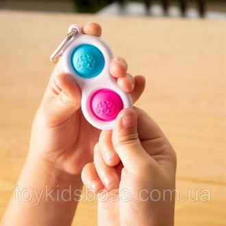 Сенсорный антистресс-брелок Fat Brain Toys Simpl Dimpl (4 цвета в ассортименте) . . фото 6