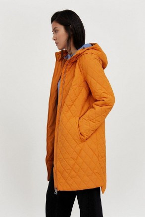 Удлиненная стеганая куртка женская от финского бренда Finn Flare. В боковых швах. . фото 4