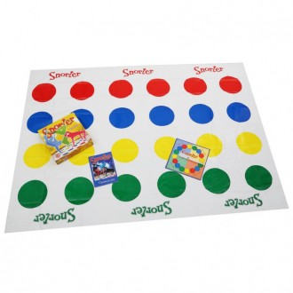 В этой игре участники перемещаются по коврику с цветными кругами. С помощью руле. . фото 4