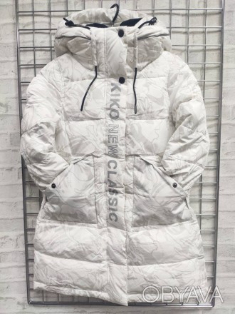 
Зимнее пальто выполнено из водоотталкивающей плащевой тканиКапюшон несъемный, и. . фото 1