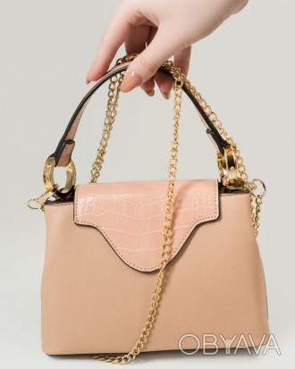 Розовая сумочка-чемоданчик на короткой ручке выполненная из эко-кожи с фактурным. . фото 1