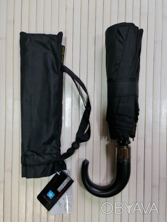 Код товара: 1193.1
Мужской черный классический зонт полуавтомат, позволяет момен. . фото 1