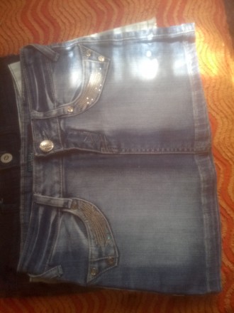 4 замечательные джинсовые юбки. Можно купить по отдельности. Цена за одну 75 грн. . фото 3