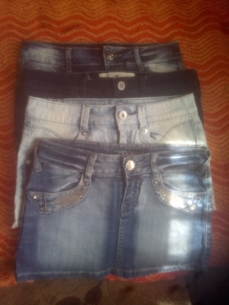 4 замечательные джинсовые юбки. Можно купить по отдельности. Цена за одну 75 грн. . фото 2