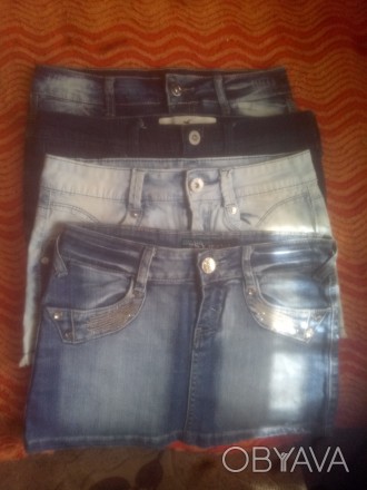 4 замечательные джинсовые юбки. Можно купить по отдельности. Цена за одну 75 грн. . фото 1