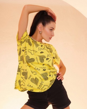 Эластичная футболка выполненная из легкого вискозного трикотажа желтого цвета. М. . фото 2
