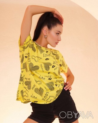 Эластичная футболка выполненная из легкого вискозного трикотажа желтого цвета. М. . фото 1