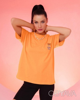 Свободная персиковая футболка выполненная из эластичного хлопкового трикотажа. М. . фото 1