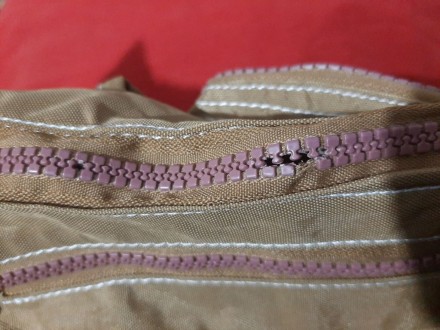 Женская сумка из плащевой ткани (уценка)

Практичная ткань
Впереди два карман. . фото 5