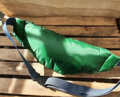 Легкая удлиненная сумка на пояс,зеленого цвета.
Болоневая серебрянка сверху и в. . фото 3