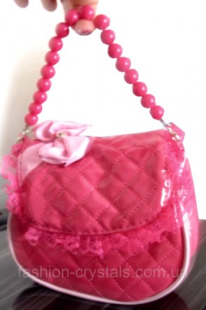 Красивая нарядная сумочка для девочки, кружевная оборочка и бантик придает элега. . фото 3