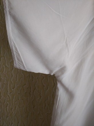 Белая красивая блузка ,кофточка,футболка.
ПОГ 55 см.
Ширина кофточки по низу п. . фото 5