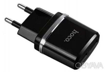 Описание Сетевого адаптера HOCO C12 7091, 2 USB, черного
Сетевой адаптер HOCO C1. . фото 1