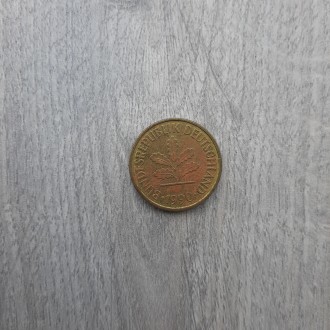 Монета ФРГ 5 пфеннигов 1990 D

Сталь с латунным покрытием. . фото 2