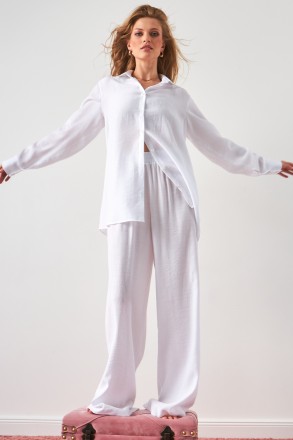 Женский костюм Stimma Кетнис. Костюм с однотонной ткани, состоит из штанов и руб. . фото 2