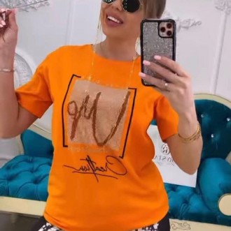 Женская оранжевая футболка со стразами. Размер S.
	
	
	Размер
 S
 M
 L
	
	
	груд. . фото 2