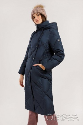 Длинное стеганое пальто прямого кроя выполнено из текстиля с влагоотталкивающими. . фото 1