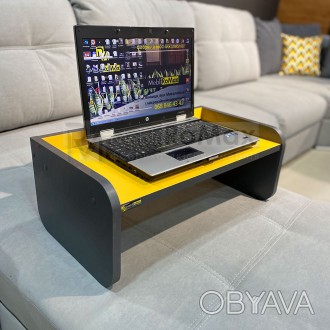 Підставка для ноутбука може допомогти організувати роботу в домашніх умовах. Сто. . фото 1
