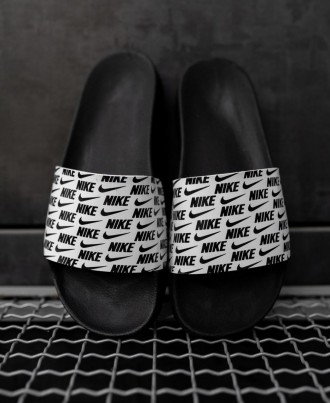 Тапочки мужские черно-белые Nike Slides Small Logo
Крутые мужские тапочки Найк С. . фото 2