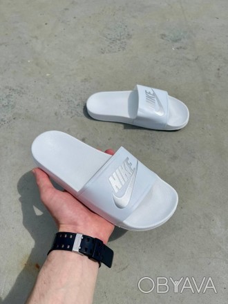 Тапочки женские белые Nike 
Стильные женские шлепки Найк в однотонной белой расц. . фото 1
