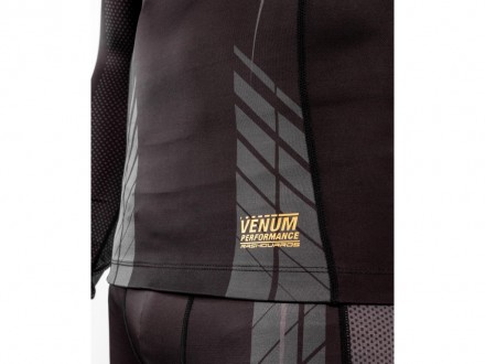 Описание:
Размеры: S, M, L.
Рашгард VENUM Athletics Compression Long Sleeve T-sh. . фото 4