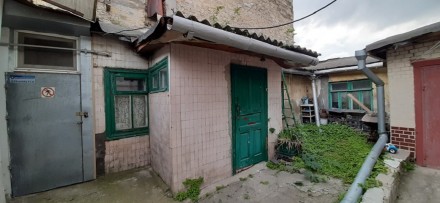 
 13875... Продам часть дома под магазин на Молдаванке. Окно смотрит на территор. Молдаванка. фото 2