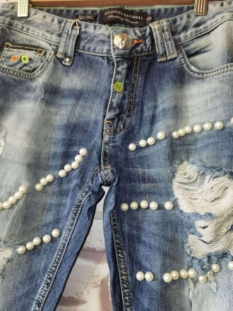 Жіночі сині джинси з потертостями та намистинами. Середня посадка вільного фасон. . фото 4