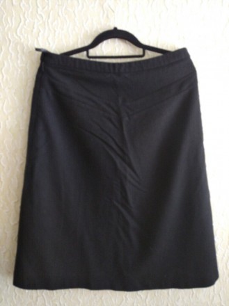 Шерстяная юбка с вышивкой, на подкладке, E-Vie.
Цвет -черный .
Состав- 55% шер. . фото 3