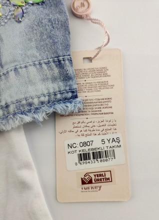 
Турецкий джинсовый костюм для девочки. В комплект входит шорты, пиджак и футбол. . фото 8