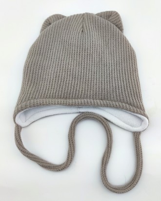
 
Тёплая вязаная детская шапка. Очень приятная, мягкая и тёплая ткань. Для дево. . фото 3