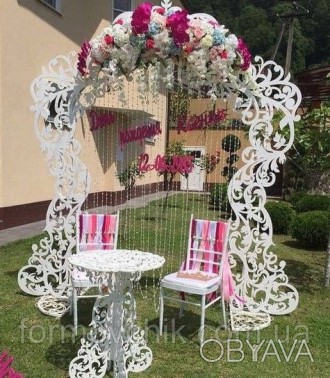 
Арка для свадебной церемонии
 
Свадебная арка станет центром внимания на вашем . . фото 1