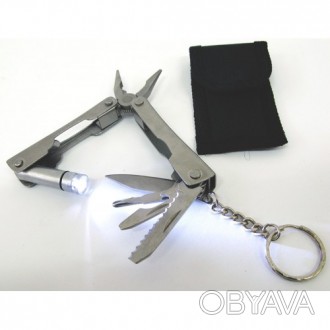Нож-плоскогубцы с набором инструментов (9 в 1). Размер 7 см.
 
. . фото 1