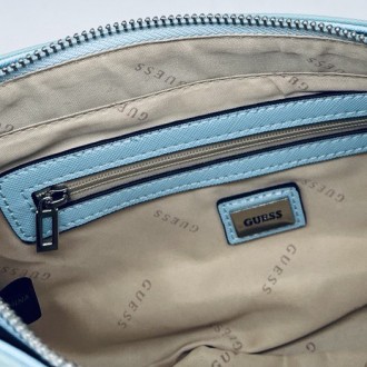 
ВИДЕООБЗОР
Женская сумка GUESS через плечо
Классическая женская сумочка багет ч. . фото 10