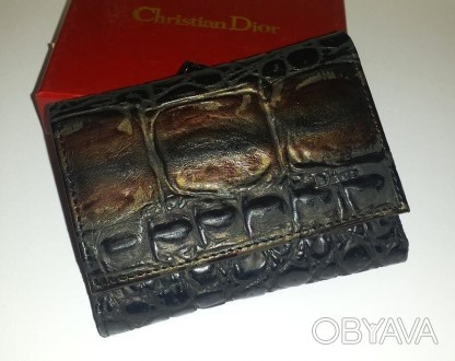 
Высококачественный кошелёк из натуральной кожи Christian Dior.
Внутри кошелька . . фото 1