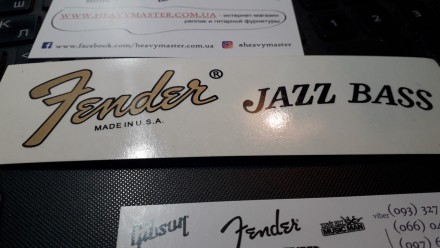 Деколь для бас-гитары Fender Jazz Bass наклейка логотип
Цвет тусклое золото.
Нак. . фото 3
